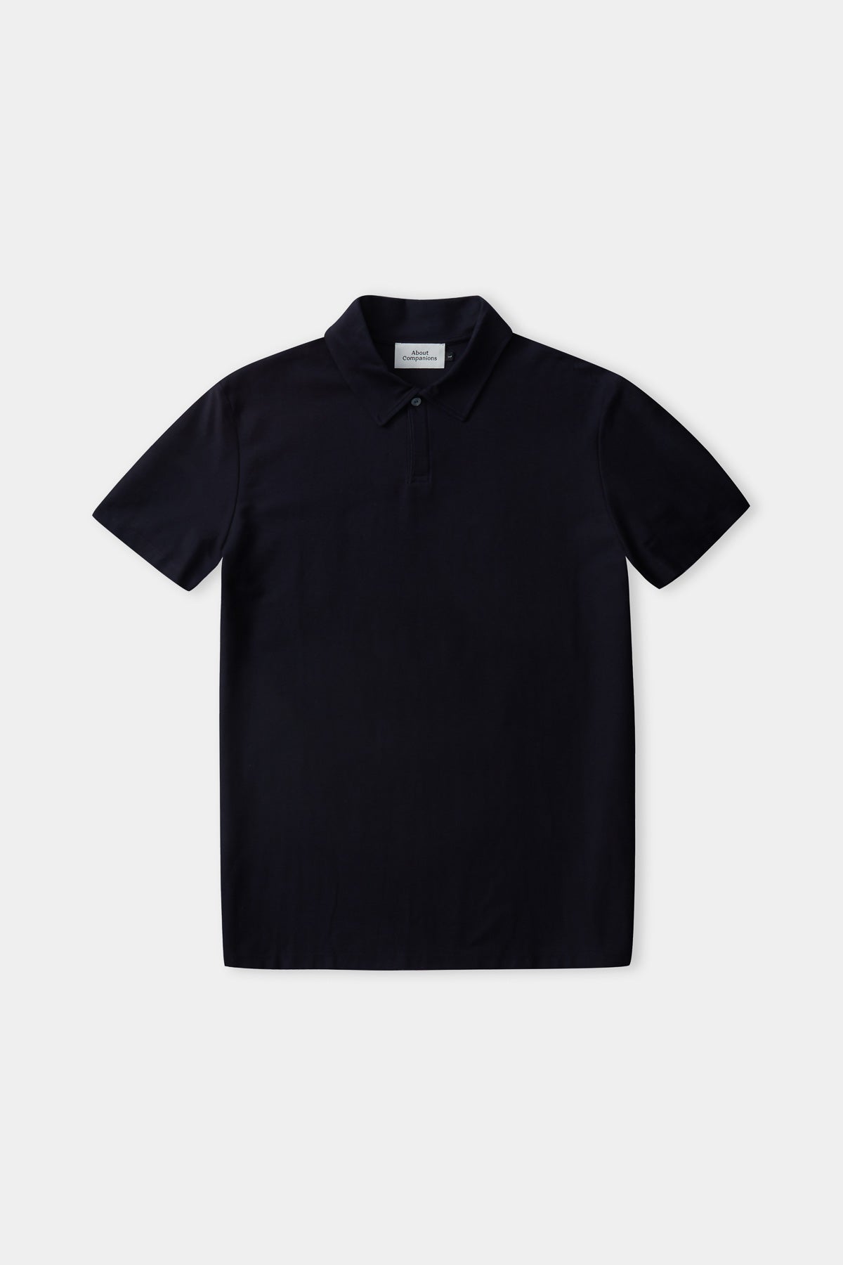 todd polo, eco loopback navy - about companions